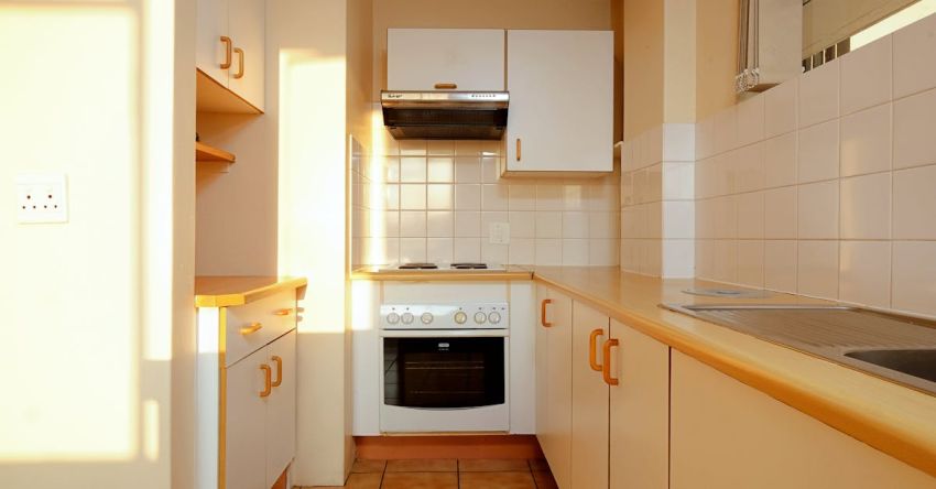 Minimalist Kitchen - A kitchen with a stove and oven in it