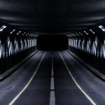 Lighting Systems - Gray Paved Road Tunnel